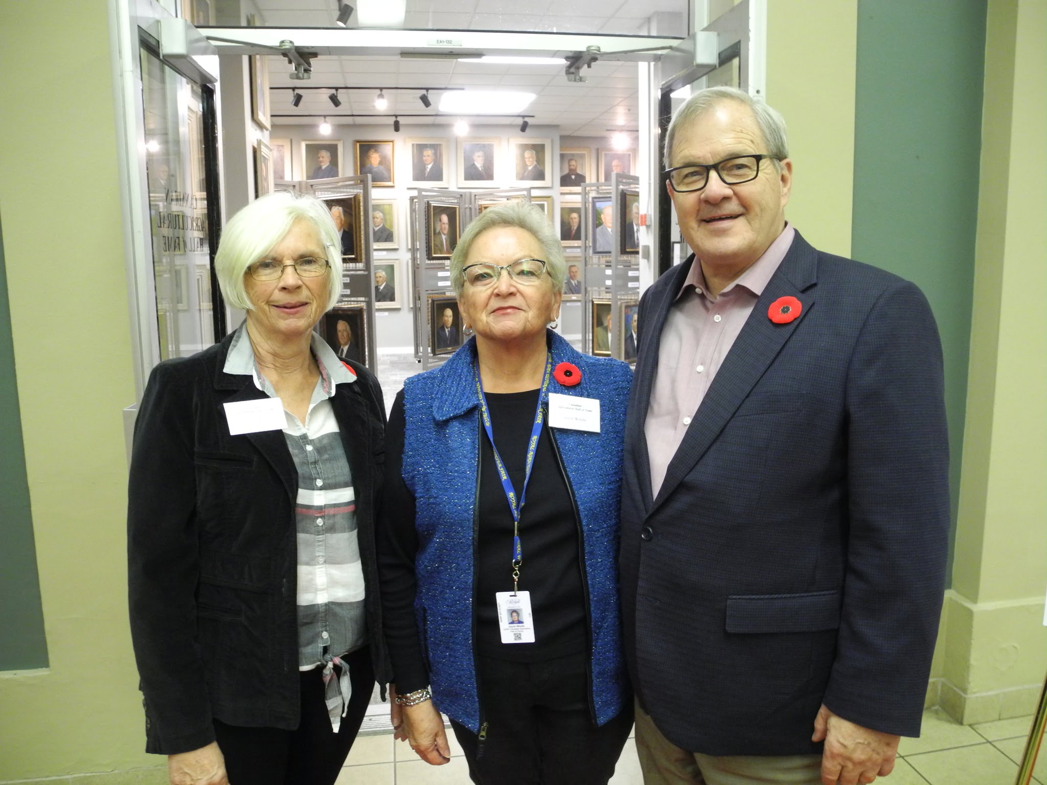 Image showing 3 people standing infront of the gallery